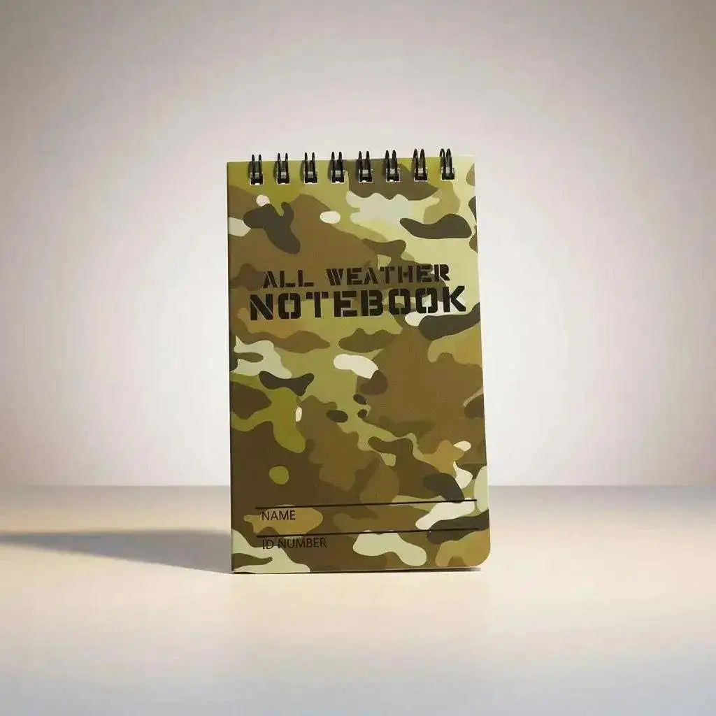 WarriorGear.eu All Weather camouflage spiral-bound notebook for outdoor use. Features waterproof paper and a space for name/ID.