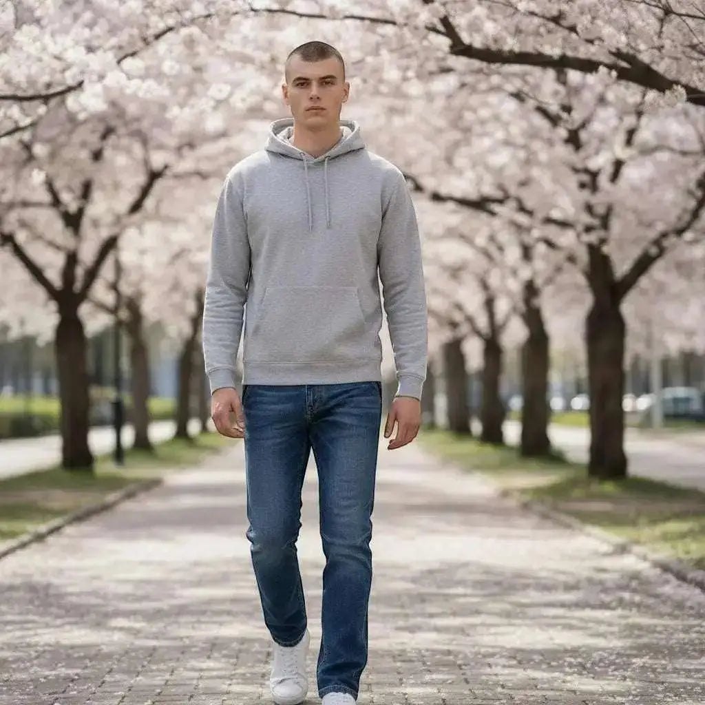 WarriorGear.eu men's blue stretch denim tactical jeans with reinforced knees and multiple pockets, worn by a model walking outdoors.