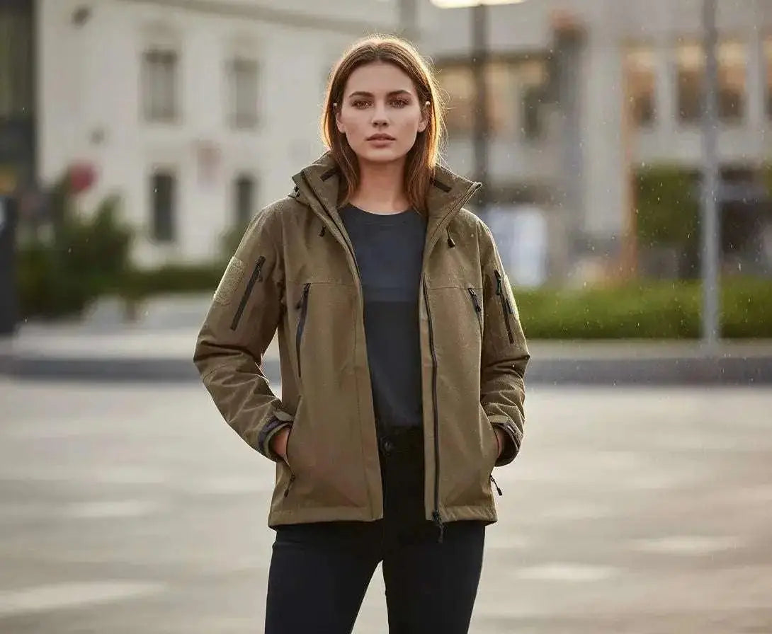 WarriorGear.eu coyote/olive hardshell tactical jacket with waterproof zippers and velcro patches on sleeves.