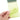 WarriorGear.eu All Weather camouflage spiral-bound notepad with yellow lined paper, held by a hand.