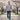WarriorGear.eu men's blue stretch denim tactical jeans with reinforced knees and multiple pockets, worn by a model walking outdoors.