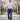 WarriorGear.eu men's blue stretch denim tactical jeans with reinforced knees and multiple pockets, worn by a model walking outdoors.